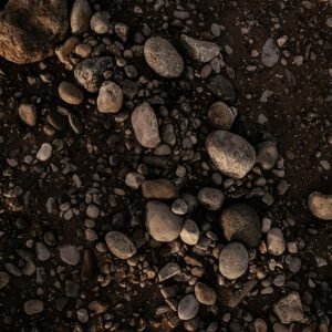 A detailed view of textured earth and rocks in Quetta, Balochistan, Pakistan.